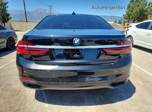 WBA7F0C59GGM20875 2016 BMW OTHER Черный Вид салона спереди