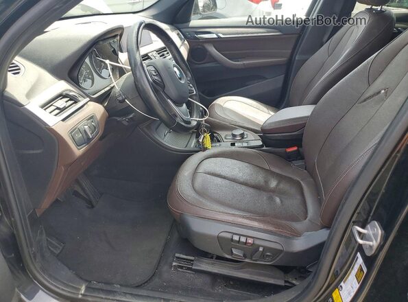 WBXHT3Z37H4A56438 2017 BMW X1 Черный Вид панели приборов