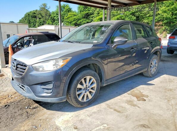 JM3KE2BY6G0832131 2016 MAZDA CX-5 Gray Vista tres cuartos delantera izquierda