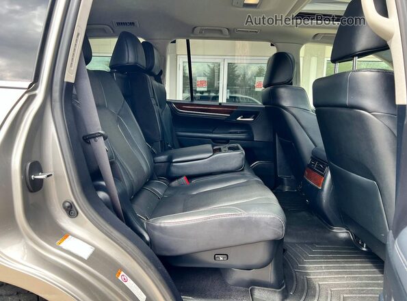 JTJHY7AX1K4294856 2019 LEXUS LX Серебряный Вид салона спереди