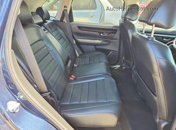 7FARS3H74PE004086 2023 HONDA CR-V Blue Rear interior view