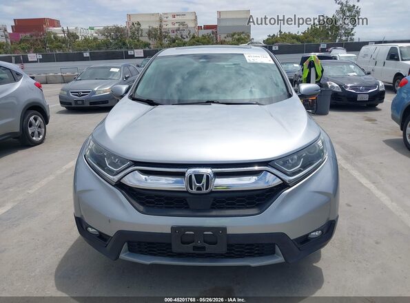 7FARW1H55HE034383 2017 HONDA CR-V Серебряный Вид щитка приборов