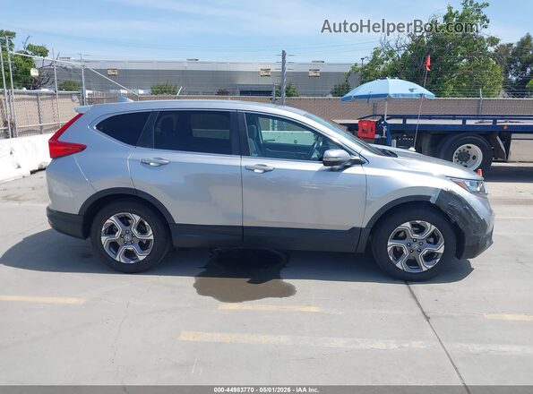7FARW1H88JE028772 2018 HONDA CR-V Серебряный Вид задней части салона