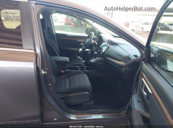 7FARW2H52KE024455 2019 HONDA CR-V Серый Вид салона спереди