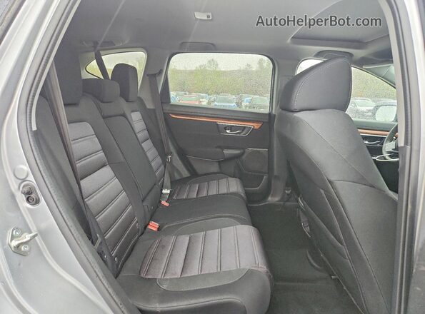 7FARW2H53JE028111 2018 HONDA CR-V Silver Widok wnętrza z tyłu