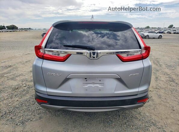 7FARW2H87JE061302 2018 HONDA CR-V Silver Rear view