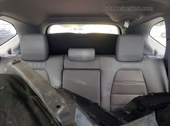 7FARW2H87JE061302 2018 HONDA CR-V Silver Rear seats view
