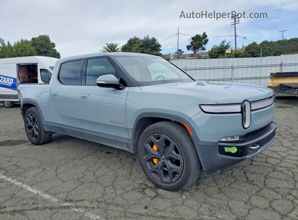 7FCTGAAA6PN024073 2023 RIVIAN R1T Gray Delantero derecho
