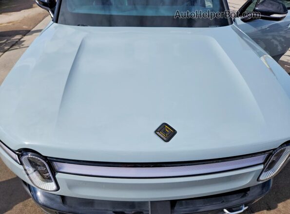 7FCTGAAA9NN005675 2022 RIVIAN R1T Gray Vista interior trasera