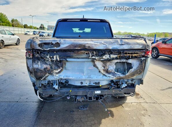 7FCTGAAA9NN005675 2022 RIVIAN R1T Gray Vista trasera