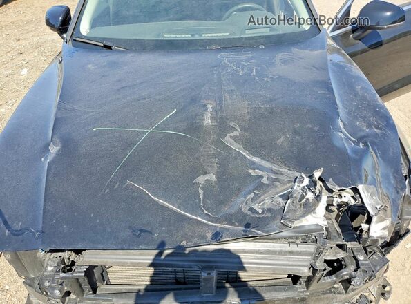 7JRL12TL7NG172845 2022 VOLVO S60 Black Widok wnętrza z tyłu