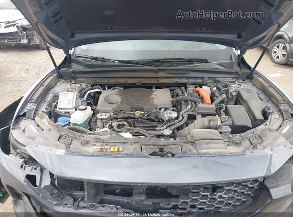 7MMVAAEW9SN133173 2025 MAZDA CX-50 HYBRID Gray Vista trasera