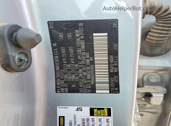 7MUBAABG5PV049956 2023 TOYOTA COROLLA Silver Widok naklejki z numerem VIN
