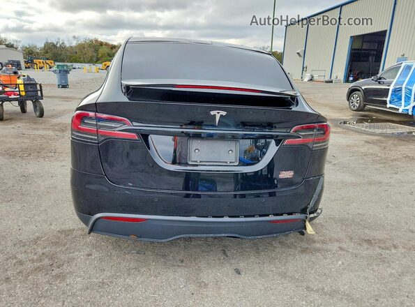 7SAXCBE69NF355386 2022 TESLA MODEL Black უკანა ხედი