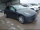 2024 Tesla Model Y Long Range Dual Motor All-wheel Drive Gray vin: 7SAYGAEE0RF014491
