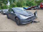 2023 Tesla Model Y Awd/long Range Dual Motor All-wheel Drive Gray vin: 7SAYGAEE1PF835760