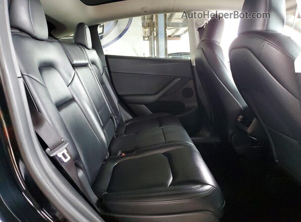 7SAYGAEE1PF958670 2023 TESLA MODEL Black Vista de los asientos traseros