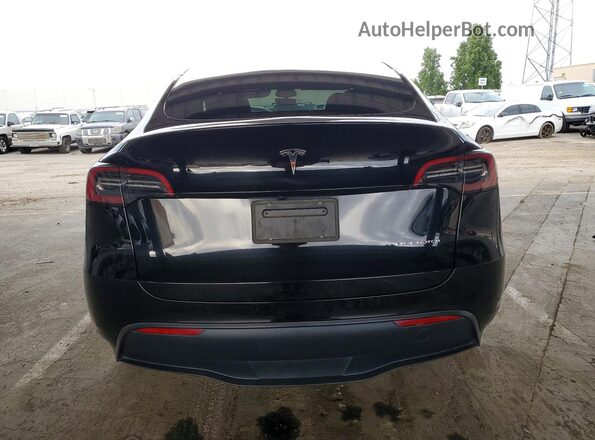 7SAYGAEE1PF958670 2023 TESLA MODEL Black Vista trasera