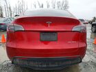 2024 Tesla Model Y Red vin: 7SAYGAEE1RF001992
