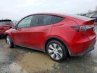 2024 Tesla Model Y Red vin: 7SAYGAEE1RF001992