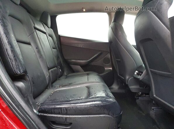 7SAYGAEE1RF001992 2024 TESLA MODEL Red Rear interior view