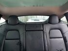 2024 Tesla Model Y Red vin: 7SAYGAEE1RF001992