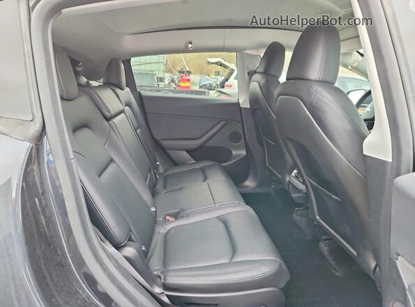 7SAYGAEE1SF287753 2025 TESLA MODEL Угольный Вид задней части салона