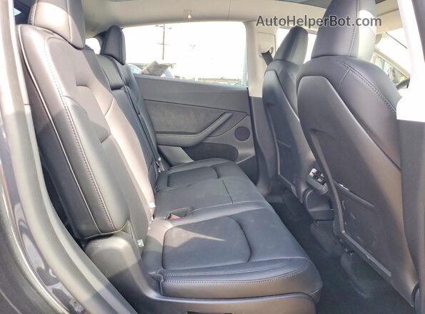 7SAYGAEE1SF302445 2025 TESLA MODEL Gray Rear seats view