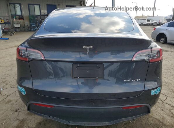 7SAYGAEE1SF302445 2025 TESLA MODEL Gray Rear view
