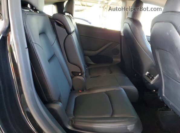 7SAYGAEE2PF926486 2023 TESLA MODEL Black Սալոնի հետևի տեսք