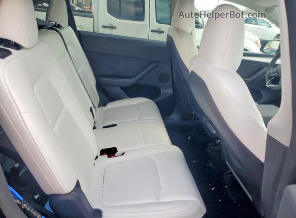 7SAYGAEE2RF068746 2024 TESLA MODEL Black Rear seats view