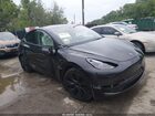 2025 Tesla Model Y Long Range Dual Motor All-wheel Drive Gray vin: 7SAYGAEE2SF216660