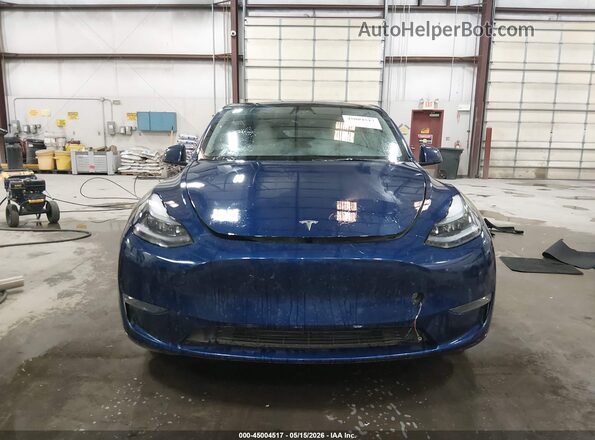 7SAYGAEE2SF251148 2025 TESLA MODEL Y Blue Widok wnętrza z tyłu
