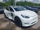 2023 Tesla Model Y Awd/long Range Dual Motor All-wheel Drive Белый vin: 7SAYGAEE4PF864525