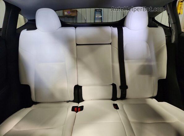7SAYGAEE4RF176558 2024 TESLA MODEL White Rear seats view