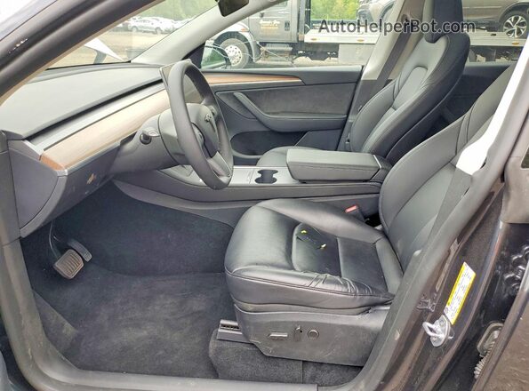 7SAYGAEE4RF207551 2024 TESLA MODEL Gray Front interior view