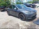 2023 Tesla Model Y Awd/long Range Dual Motor All-wheel Drive Gray vin: 7SAYGAEE5PF854991