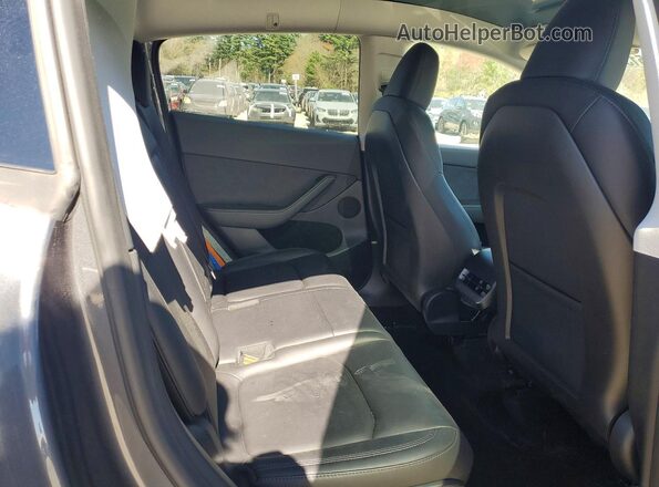 7SAYGAEE5PF935196 2023 TESLA MODEL Gray Widok tylnych siedzeń