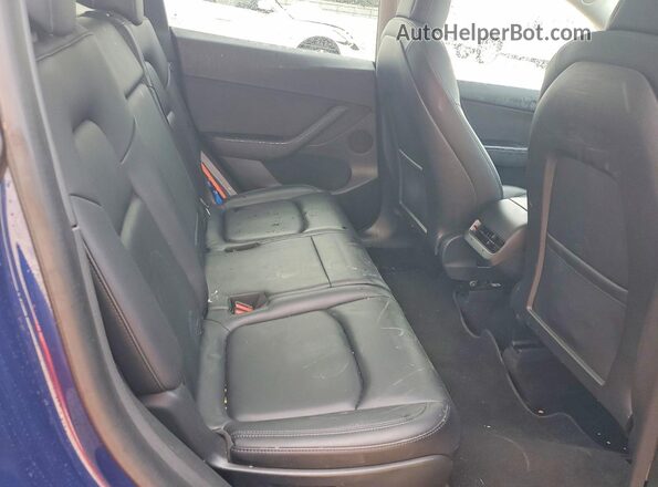 7SAYGAEE6NF393362 2022 TESLA MODEL Blue Vista de los asientos traseros