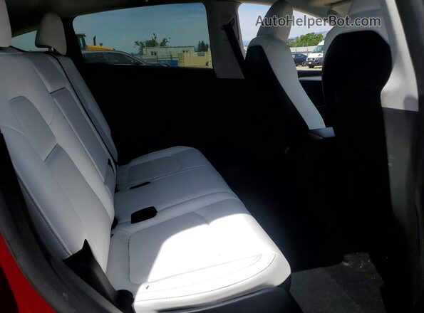 7SAYGAEE6RF069513 2024 TESLA MODEL Red Вид задніх сидінь