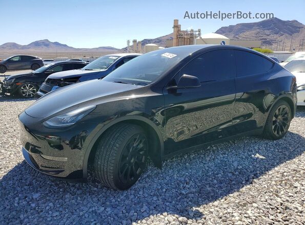 7SAYGAEE7NF576527 2022 TESLA MODEL Black Vista tres cuartos delantera izquierda