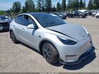 2024 Tesla Model Y Long Range Dual Motor All-wheel Drive Silver vin: 7SAYGAEE7RF169751