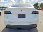 2023 Tesla Model Y Белый vin: 7SAYGAEE8PF669737