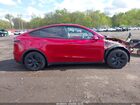 2024 Tesla Model Y Long Range Dual Motor All-wheel Drive Red vin: 7SAYGAEE8RF184078