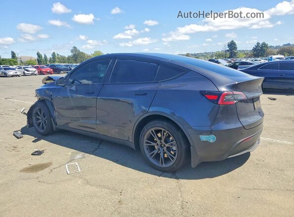 7SAYGAEE8SF282064 2025 TESLA MODEL Charcoal Trasero izquierdo