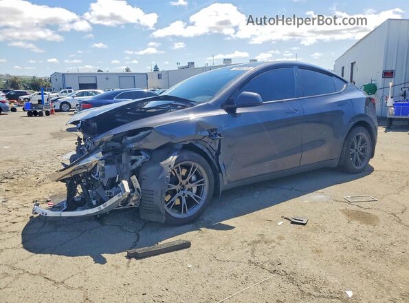 7SAYGAEE8SF282064 2025 TESLA MODEL Charcoal Vista tres cuartos delantera izquierda