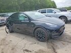2025 Tesla Model Y Black vin: 7SAYGAEE8SF293114
