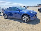 2023 Tesla Model Y Белый vin: 7SAYGAEEXPF946324