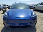 2023 Tesla Model Y Белый vin: 7SAYGAEEXPF946324