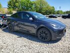 2024 Tesla Model Y Gray vin: 7SAYGAEEXRF077047